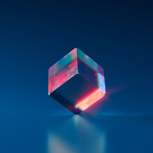 colored translucent cube balancing on a corner